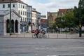 Anderlecht, Brussels Capital Region, Belgium - Mother and child cycling at the Anderlecht city gate