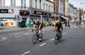 Anderlecht, Brussels Capital Region, Belgium - Two racing cyclists at the Anderlecht Gate during car free sunday