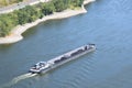 Andernach, Germany - 08 11 2022: open cargo ship with half load for low water level Royalty Free Stock Photo