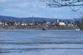 Andernach, Germany - 02 04 2021: Rhine flood with a view to Neuwied and ships on the river Royalty Free Stock Photo