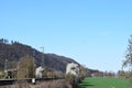 Namedy, Germany - 03 29 2021: Rhine valley railroad with blooming white trees at station Namedy Royalty Free Stock Photo