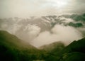 The Andes mountains and low clouds from the Inca Trail. Peru. Royalty Free Stock Photo