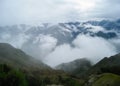 The Andes mountains and low clouds from the Inca Trail. Peru. Royalty Free Stock Photo