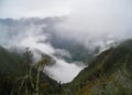 The Andes mountains and low clouds from the Inca Trail. Peru. Royalty Free Stock Photo