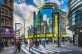 People duty free shopping, street with modern shops in Andorra