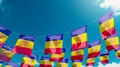 Flag of Andorra against the sky, flags hanging vertically Royalty Free Stock Photo