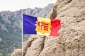 Andorranian Flag on rocky Mountains