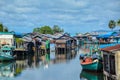 Andoung Tuek village, Cambodia- Homes on stilts hanging on the edge of Preak Piphot river