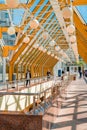 Bridge in Moscow, bright modern yellow interior inside the pedestrian bridge