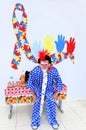 The cheerful colorful clown Mineirinho at the opening of the Clinic