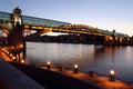 Andreyevsky (Pushkinsky) Bridge (left side) across Moskva River, located between Luzhniki and Gorky Park in Moscow, Russia Royalty Free Stock Photo