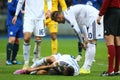 Andriy Yarmolenko looks at injured Yevhen Khacheridi, UEFA Europa League Round of 16 second leg match between Dynamo and Everton