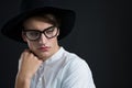 Androgynous man posing with hand on his cheek Royalty Free Stock Photo