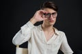 Androgynous man posing with spectacles Royalty Free Stock Photo