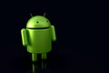 Android logo robot character, 3D on dark background