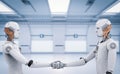 Android robot hand shaking Royalty Free Stock Photo