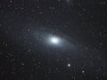 Andromeda Galaxy M31 NGC 224 and universe night sky stars over telescope Royalty Free Stock Photo