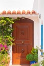 Andros, Greece 05 August 2018. Beautiful house door at Andros island in Greece.