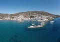 Andros island Batsi Cyclades Greece. Aerial drone view of port boat, building, sandy beach sea sky Royalty Free Stock Photo