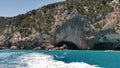 Andscape of Bue Marino Caves wth wild grass by the sea in Sardinia, Italy