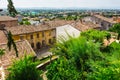 Andscape with roofs of houses in small tuscan town in province