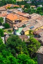 Andscape with roofs of houses in small tuscan town in province