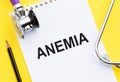 Anemia. Word write on medical notebook with stethoscope