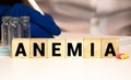 ANEMIA word written on wood block