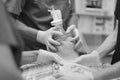 An anesthesiologist leads the patient into general anesthesia