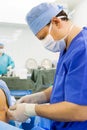Anesthesiologist performing epidural anesthesia Royalty Free Stock Photo