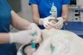 An anesthesiologists team enters the patient in general anesthesia
