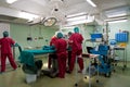 Anesthetic team preparing little patient