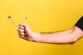 Anesthetist dentist doctor holds in his hand anesthesia syringe prior to dental surgery