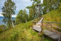 Angara river at lake Baikal in Listvyanka village. Summer landscape on Port Baikal with mountain Chersky stone. Angara River Royalty Free Stock Photo