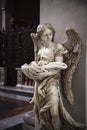 Angel. Baptismal font inside the church of St. Mary of the Angel Royalty Free Stock Photo