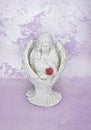 Angel Blessing Statue Figurine with key and rose Royalty Free Stock Photo