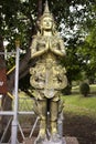 Angel brass statue in garden of Phra That Nadoon Chedi or Na Dun Pagoda for thai people travel visited and respect praying Royalty Free Stock Photo