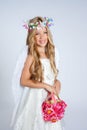 Angel children girl holding flowers bag with wings