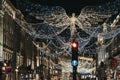 Angel Christmas lights and decorations on Regent Street in the evening, London, UK