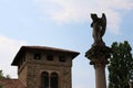 Angel on a column. Medieval house Royalty Free Stock Photo