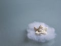 Angel in cotton wool on a frosted glass plate Royalty Free Stock Photo