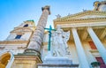 The angel with the cross at the facade entrance to the Karlskirche church in Vienna, Austria