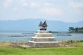 Angel deity god in small shrine beside Danau Batak Toba Lake for indonesian people foreign traveler travel visit respect praying Royalty Free Stock Photo