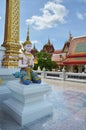 Angel or deity statue in antique ubosot for thai people travelers travel visit respect praying and blessing holy worship at Wat