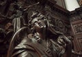 Angel with emotional expression or reflections, wooden statue in 12th century Saint Michael`s church