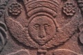 Angel face carved in red sandstone. Royalty Free Stock Photo