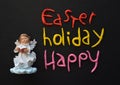 Angel Figurine,Easter Holiday Composition in White, Black, Pink, Red and Yellow Royalty Free Stock Photo