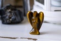 Angel figurine in tigereye stone Royalty Free Stock Photo