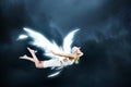 Angel girl flying high Royalty Free Stock Photo
