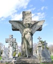 Angel guardian strong and protecting  cemetery headstone scene Royalty Free Stock Photo